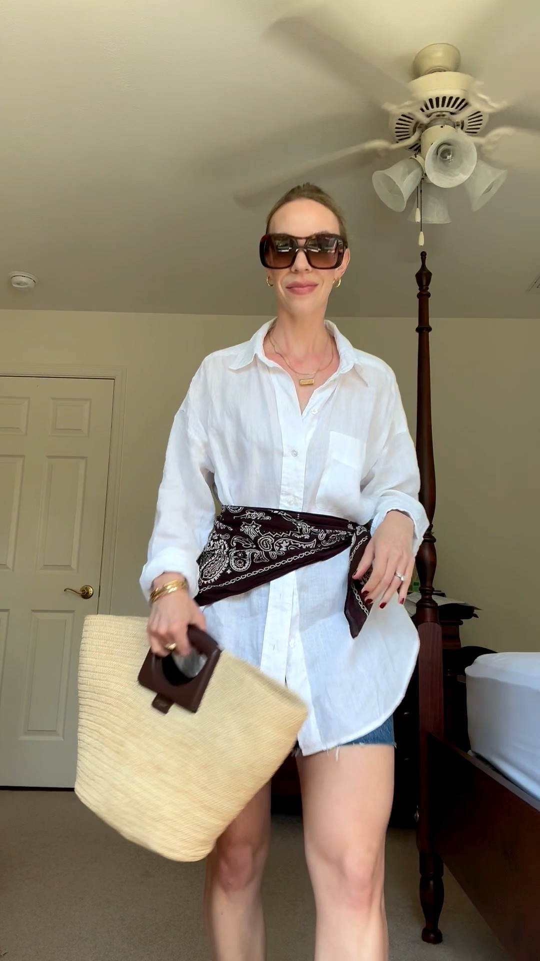 Transitional summer to fall outfit idea with oversized button down, bandana scarf, denim shorts and straw tote bag

#LTKOver40 #LTKSeasonal #LTKSaleAlert