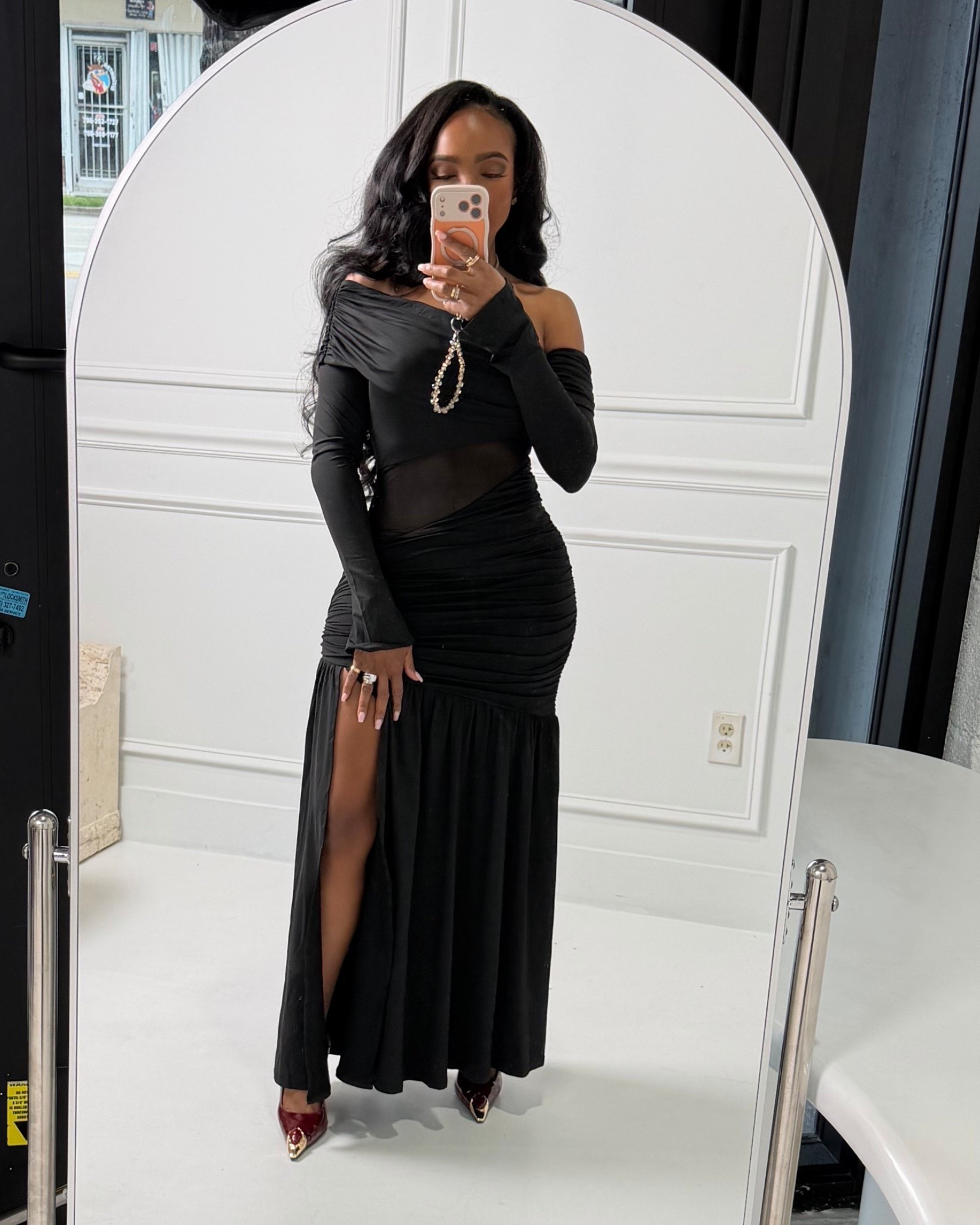 Galentine’s night done right 🖤✨  
Because dressing up with your girls deserves main-character energy. This sleek black moment is equal parts flirty, confident, and effortlessly chic — perfect for celebrating love, friendship, and a little drama.

Perfect for: Galentine’s dinner, cocktail night, birthday celebrations, or a girls’ night out.

Styling notes: The off-the-shoulder silhouette + sheer detail keeps it sexy but elevated, and the slit gives just enough movement to steal the spotlight.

A timeless black dress like this is a long-term wardrobe win — style it multiple ways and the cost per wear just keeps dropping.

Follow me on Instagram and YouTube @kirasfashionfinds