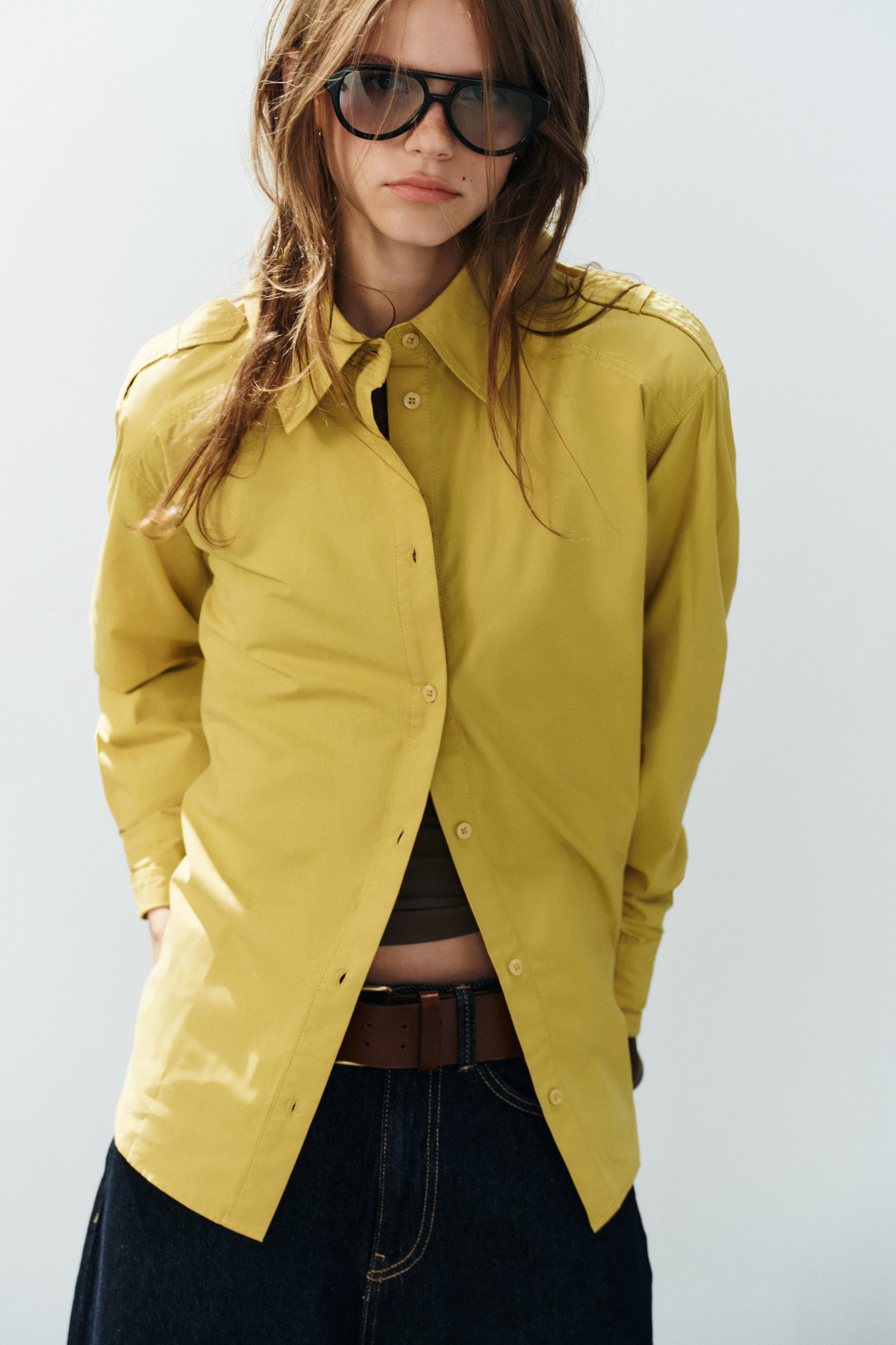 Lapel collar shirt with long sleeves and tab details. Front button closure. | Zara US