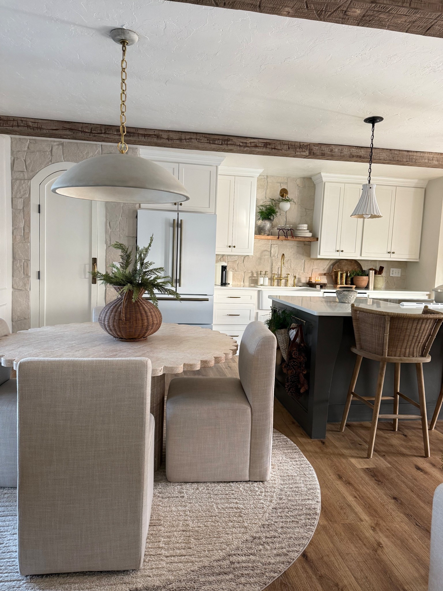 @wayfair in my home! Shop this post for my favorite items including this rug, dining chairs, and my hanging lights! Lighting really is the jewelry of a room! #ad #wayfair #wayfairpartner 

#LTKHoliday #LTKSeasonal #LTKHome