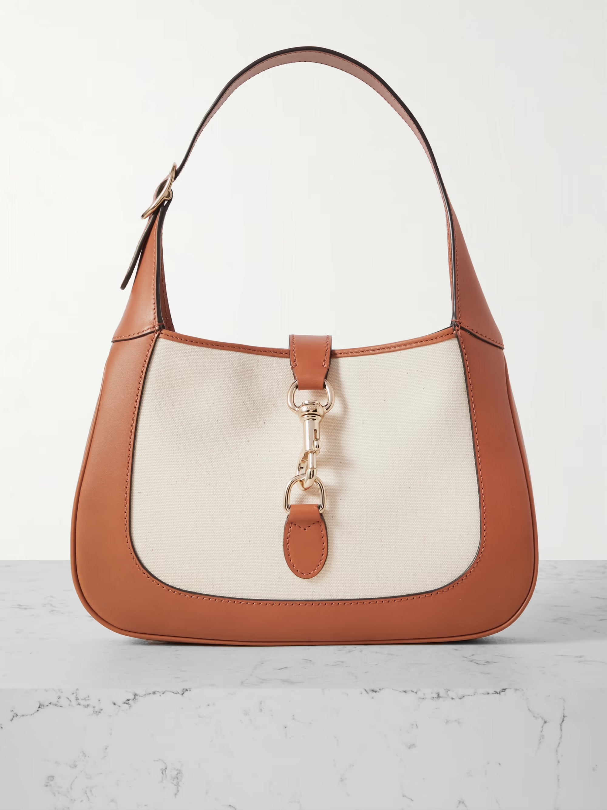 Jackie leather and canvas shoulder bag | NET-A-PORTER (US)