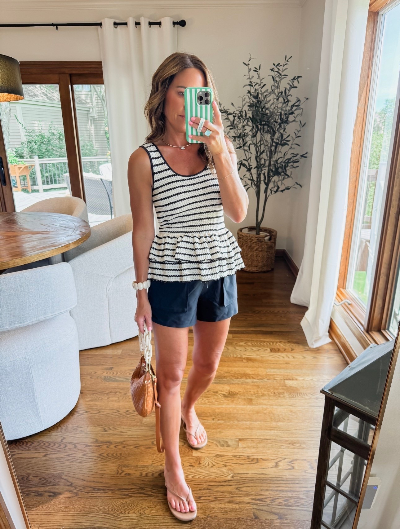 Ootd. Elevated casual. “Dressing-up” these Athleisure shorts. 
Love the texture on this peplum tank 
XS both

#LTKootd #LTKmomlife #LTKOver40