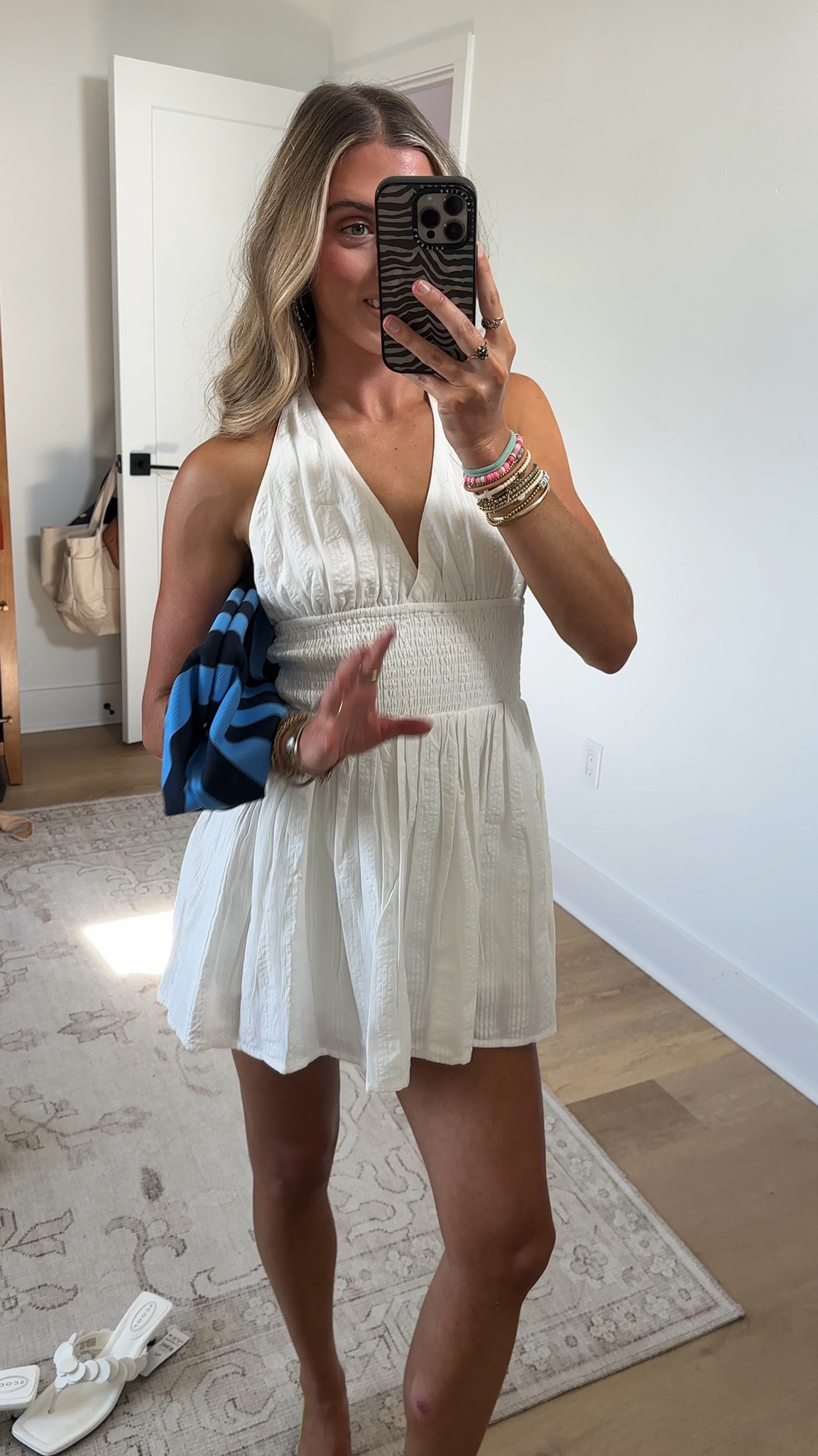 Walmart size XXS Channel all the summer vibes anytime with No Boundaries' Smocked Halter Dress. This flirty little mini dress dazzles with a plunging V-neckline, a figure-flattering smocked waist and a breezy fit and flare silhouette. The pleated texture and breezy look add to the overall relaxed feel of this dress. Slip this dress on with cute sandals and get ready to slay the day. Only at Walmart

#LTKootd #LTKSaleAlert #LTKSeasonal