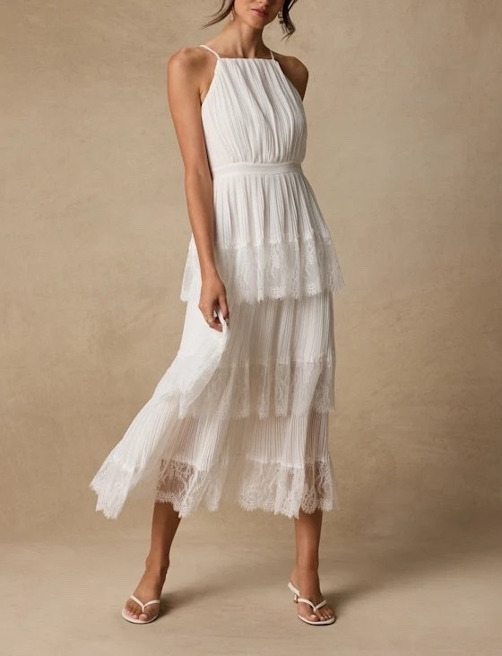 Inspired by romantic evening elegance, the Came For Cocktails White Pleated Tiered Lace Maxi Dress blends delicate lace, flowing pleats, and tiered movement for a look that feels effortlessly refined. The crisp white tone creates a timeless silhouette perfect for elevated celebrations and special occasions. Under $80.

Keywords:

* white lace maxi dress
* pleated maxi dress
* tiered maxi dress
* lace tiered dress
* wedding guest dress
* bridal shower dress
* engagement party dress
* garden party dress
* elegant maxi dress
* romantic dress
* feminine fashion
* formal white dress
* special occasion dress
* luxury maxi dress
* countryside wedding dress
* soirée dress
* statement white dress
* elegant evening dress

#LTKWedding #LTKTravel #LTKootd