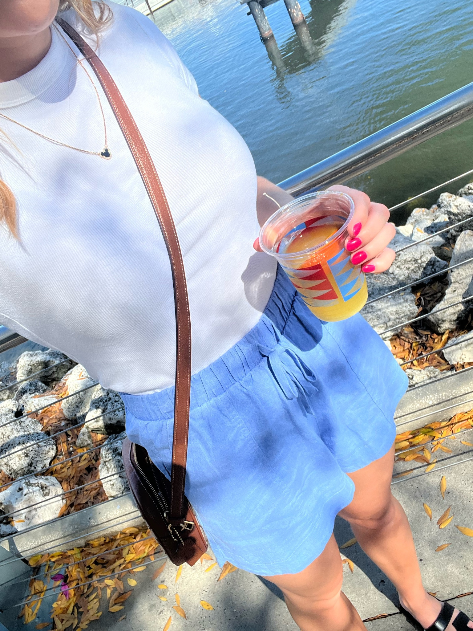 Disney Springs outfit🩵

Shorts run a little big, wearing a Small! 

Disney outfit, Disney springs, Baublebar, target, old navy, coach, Disney x coach, outfit inspo for Disney world 

#LTKstyletip