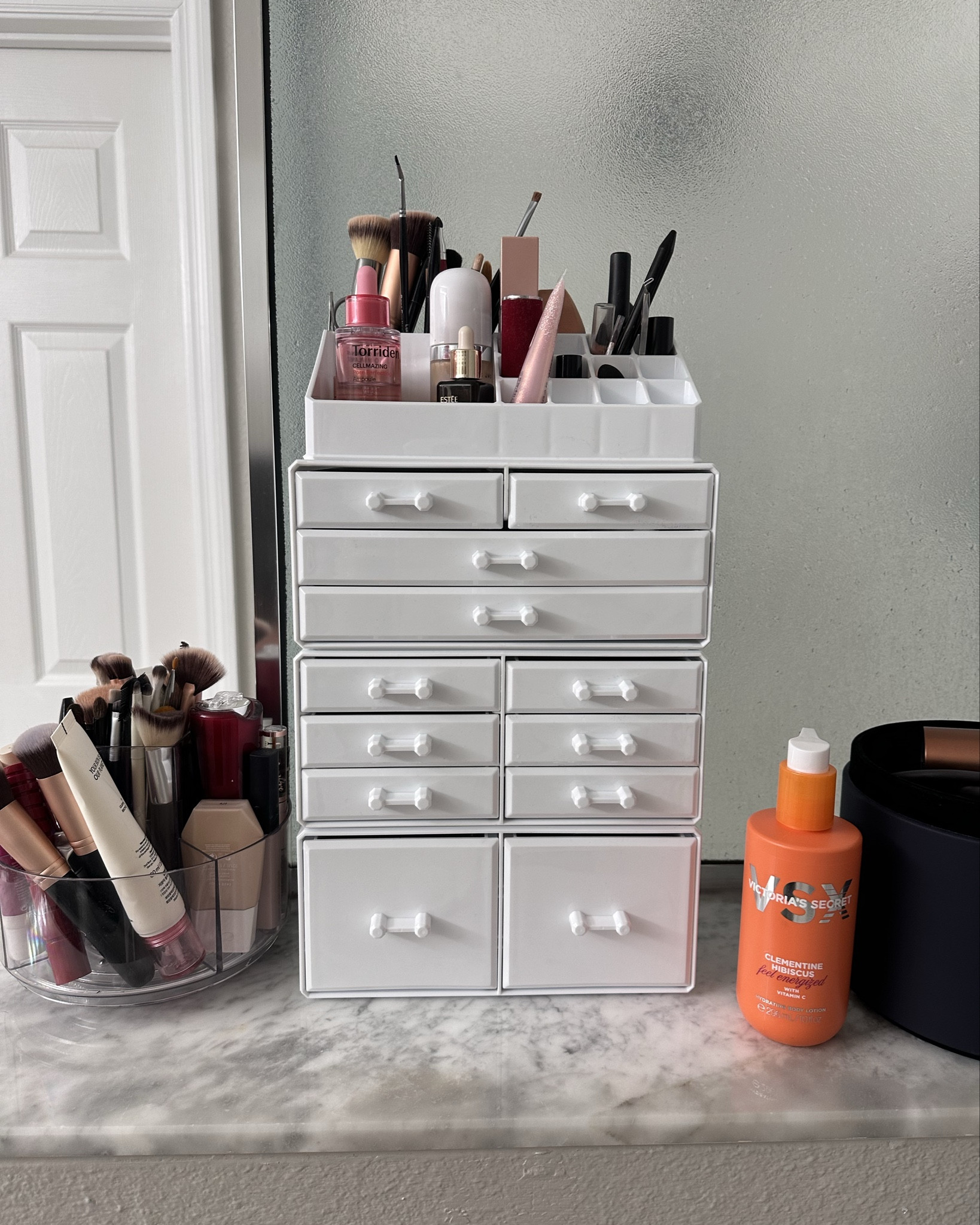 Makeup Organization

This makeup organizer keeps everything neat, visible, and easy to access. The 12-drawer design provides plenty of space for makeup, skincare, and beauty tools, making it easy to sort products by category or daily use.
These boxes can be stackable or played the way you like.
The rotatable brush holder on top is convenient for storing makeup brushes, eyeliners, and lip products while keeping them upright and organized. The drawers slide smoothly and help reduce countertop clutter, which works well for small vanities or bathroom counters.

A practical solution for keeping makeup organized, protected, and easy to find during daily routines. Linked here.

#LTKHome #LTKU #LTKBeauty