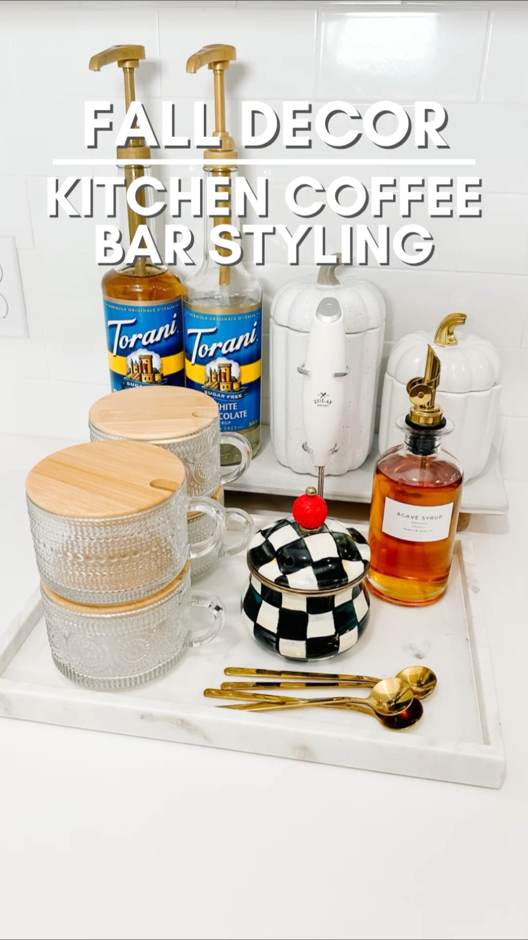 🍁FALL KITCHEN COFFEE BAR STYLING🍁 I’m slowing adding fall elements to our home and these pumpkin canisters I found @homegoods definitely made this corner of my kitchen a bit more festive. 

🍁My mugs come with spoons, tops, AND coasters and are an @amazonhome find. My syrup holder, syrups AND the gold syrup pumps, and milk frother are also from @amazon #amazonfinds #amazonfinds2023 #amazonhome 

🍁 My marble tray is from @target and it’s perfect for the kitchen and I even have it in my bathroom as well! #targetfinds #targetfind #ifounditattarget #kitchendecor #fallkitchendecor #fallkitchendecorating 


#LTKSeasonal #LTKhome #LTKSale