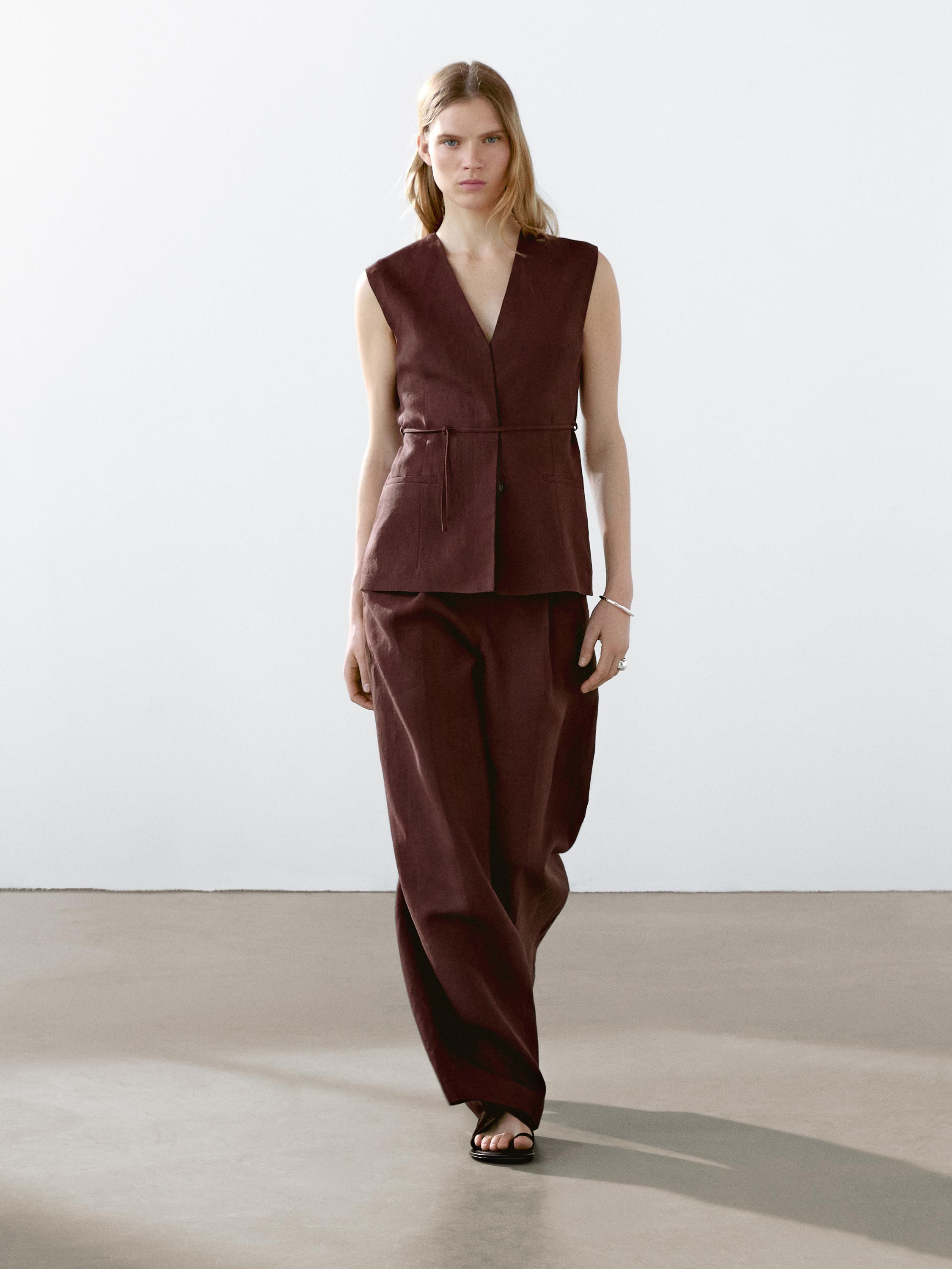 Waistcoat made of 100% linen fabric . V-neck . Front button fastening concealed by a placket. Thi... | Massimo Dutti US