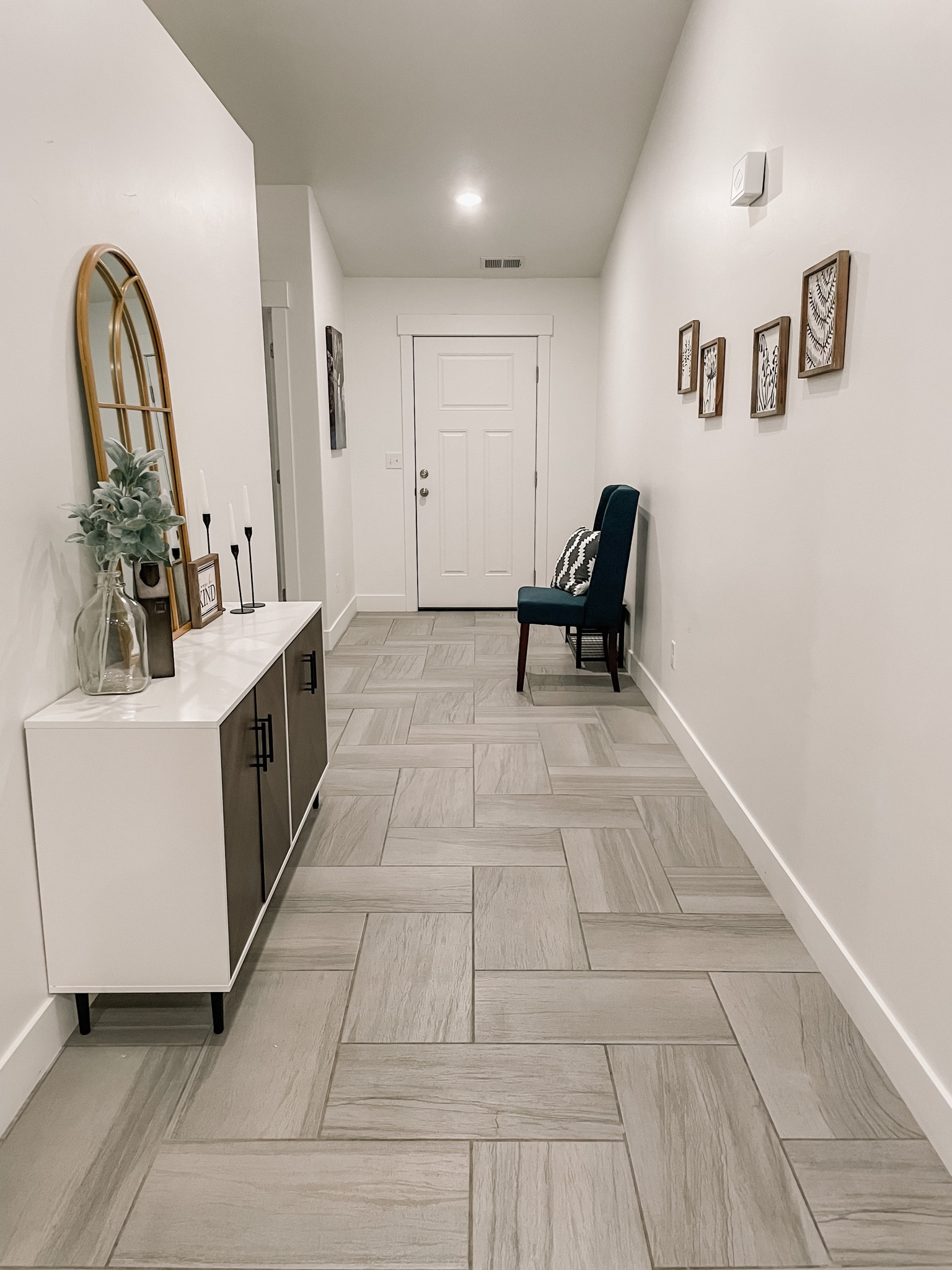 I loved staging this home and now it’s time to take it down. The new homeowners are buying everything in this hallway!

#LTKfamily #LTKFind #LTKhome