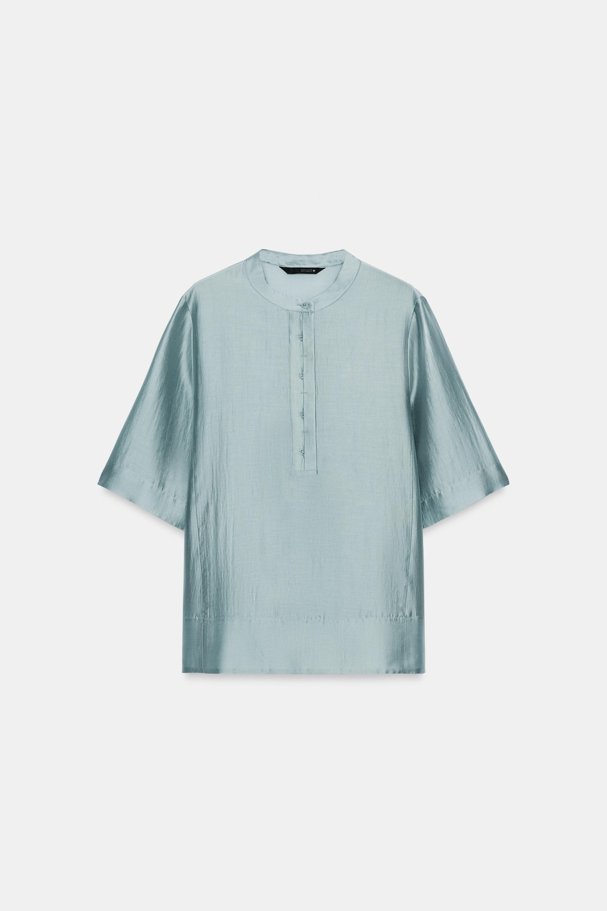 ZARA WOMAN COLLECTIONBlouse made of a lyocell blend yarn. Round neck and short sleeves. Straight ... | Zara Canada