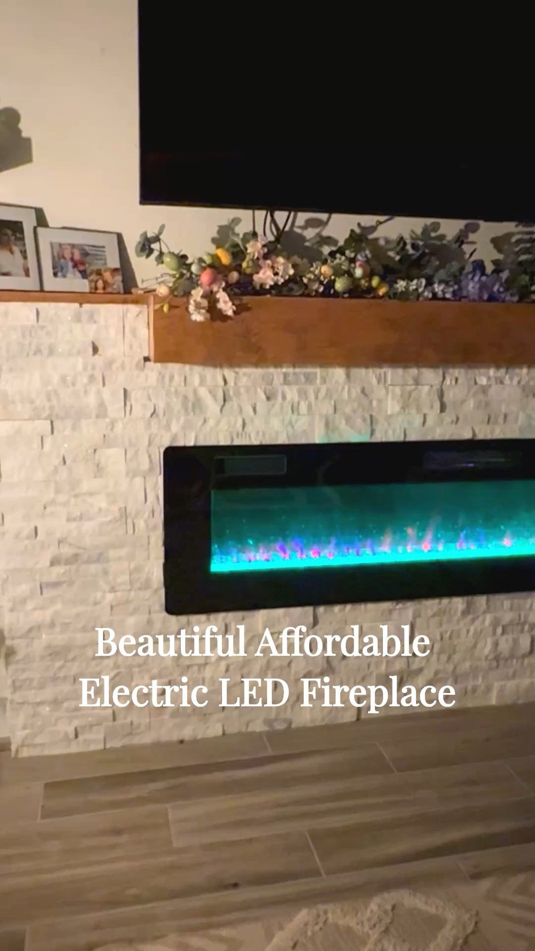 Amazing Recessed Flush Wall Mounted Electric Fireplace with heat, color changing, timer, remote control, low noise. Adjustable, flame height, color and speed! 
Ultra thin and sleek. Easy to install by a handyman or contractor. 
Perfect wall accent to create a cozy living room or bedroom or loft!￼ this fireplace looks expensive but it’s actually very affordable. We’ve had hours for four years and it’s still working great. 

#LTKOver40 #LTKHome #LTKSaleAlert