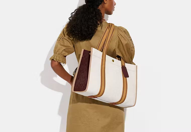 Spin Tote 42 In Signature Jacquard | Coach (US)