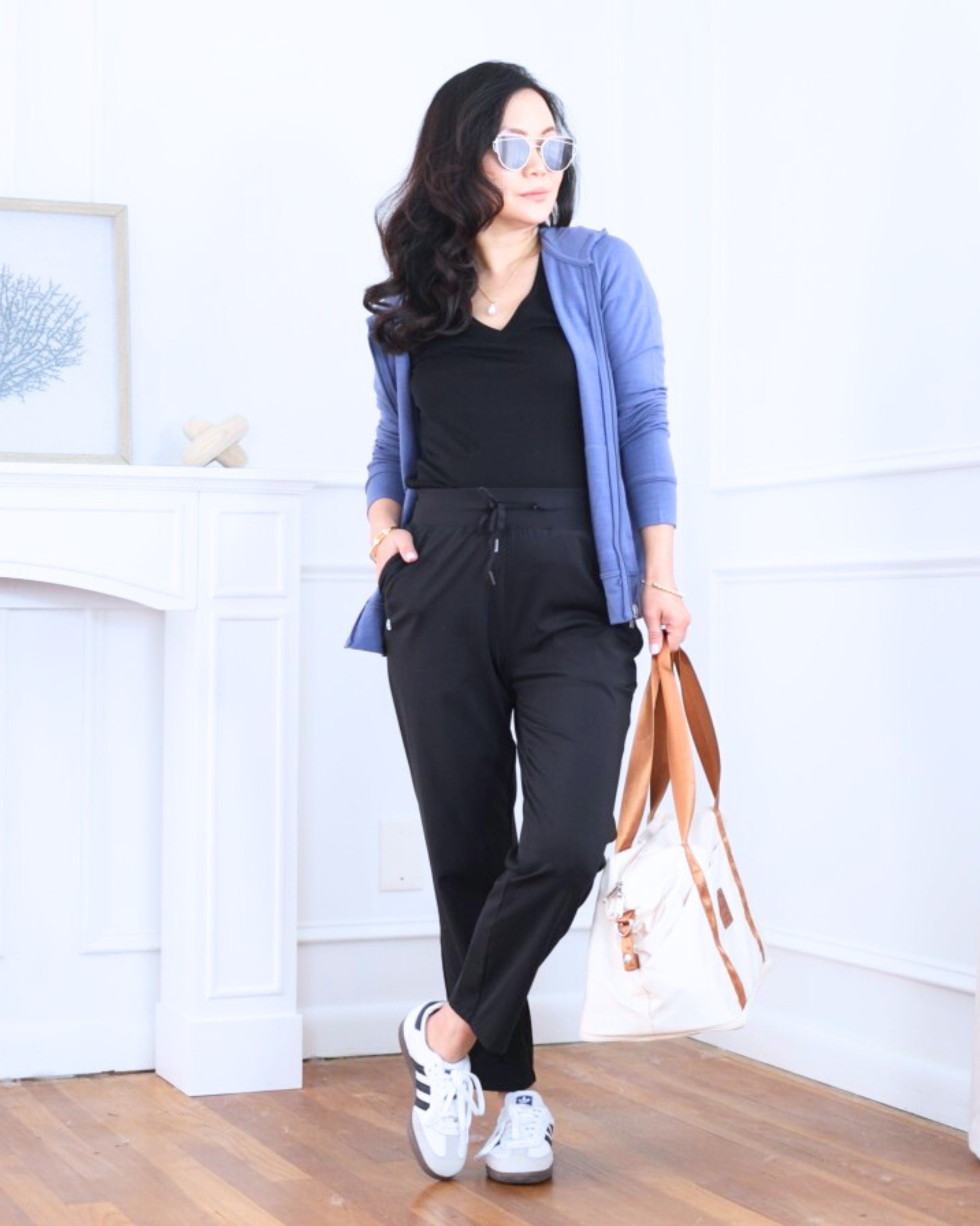 Comfort-first but still pulled together — wearing a travel hoodie and black tee from Unbound Merino with ankle pants from Amazon and Samba OG sneakers. Easy, breathable, and perfect for long days on the go without feeling sloppy. I’m 5’2, wearing size XS.

#LTKootd #LTKPetite #LTKOver40