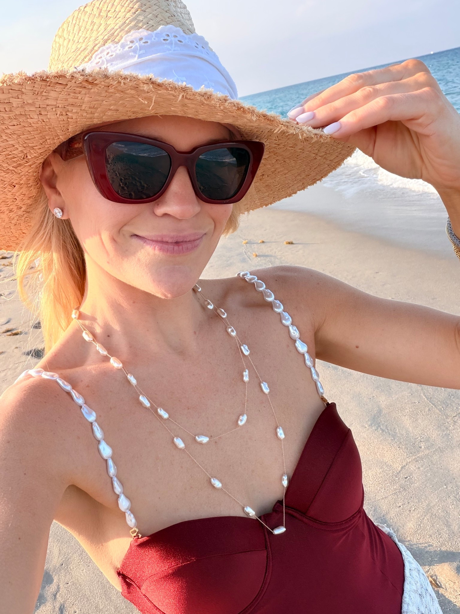 Bauble bar necklace and palmacea one piece swimsuit 

#LTKSwim #LTKootd