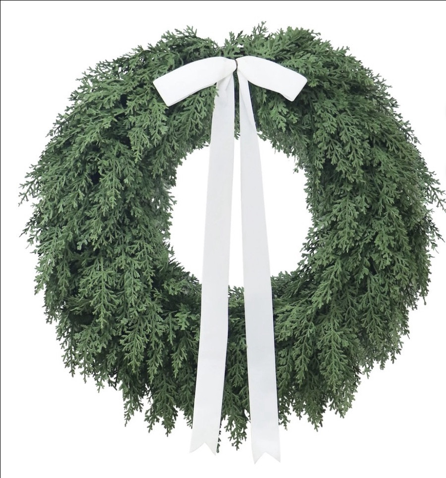 Christmas wreath that looks real! 

#LTKFindsUnder50 #LTKSeasonal #LTKHome