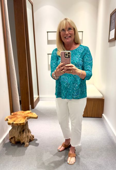 This great spring top looks good coming and going! It would be great with navy, white or denim pants or shorts! It is a versatile addition to any travel wardrobe.Summer Outfit. 

#LTKover40 #LTKstyletip #LTKtravel