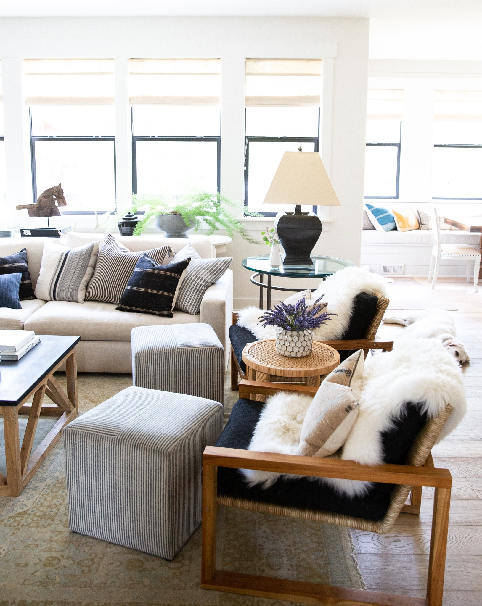 Looking for a living room refresh after all of the holiday madness? Shop our living room look for a breath of new life through rugs, pillows, accent chairs, and upholstered cubes!

#LTKhome #LTKstyletip
