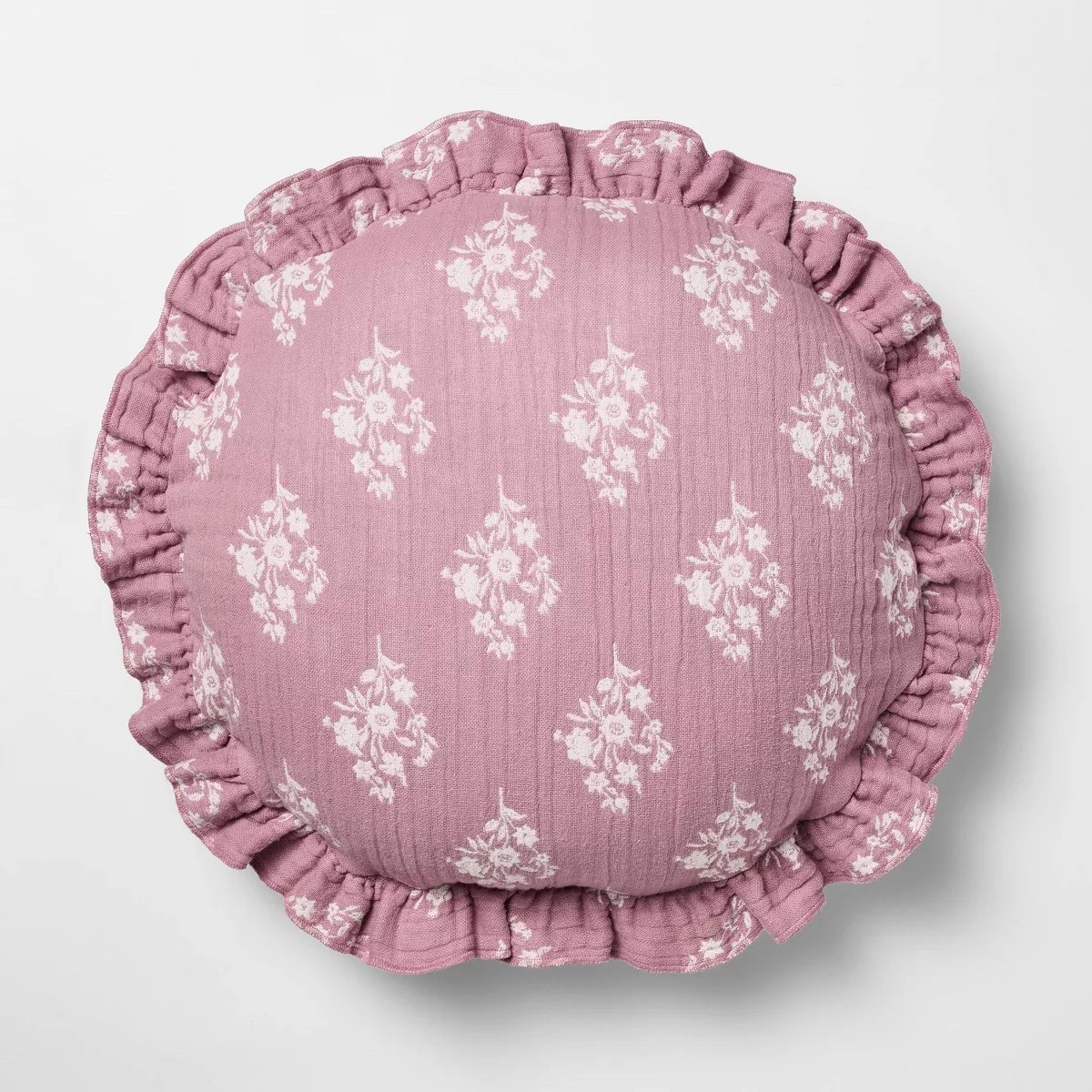 Add a charming accent to any room with the Threshold™ x Studio McGee Round Ruffle Floral Jacquard Pillow. Featuring a delicate floral print and elegant ruffled edges, this round pillow brings style and texture to your space.

#LTKSaleAlert #LTKHome #LTKFindsUnder50