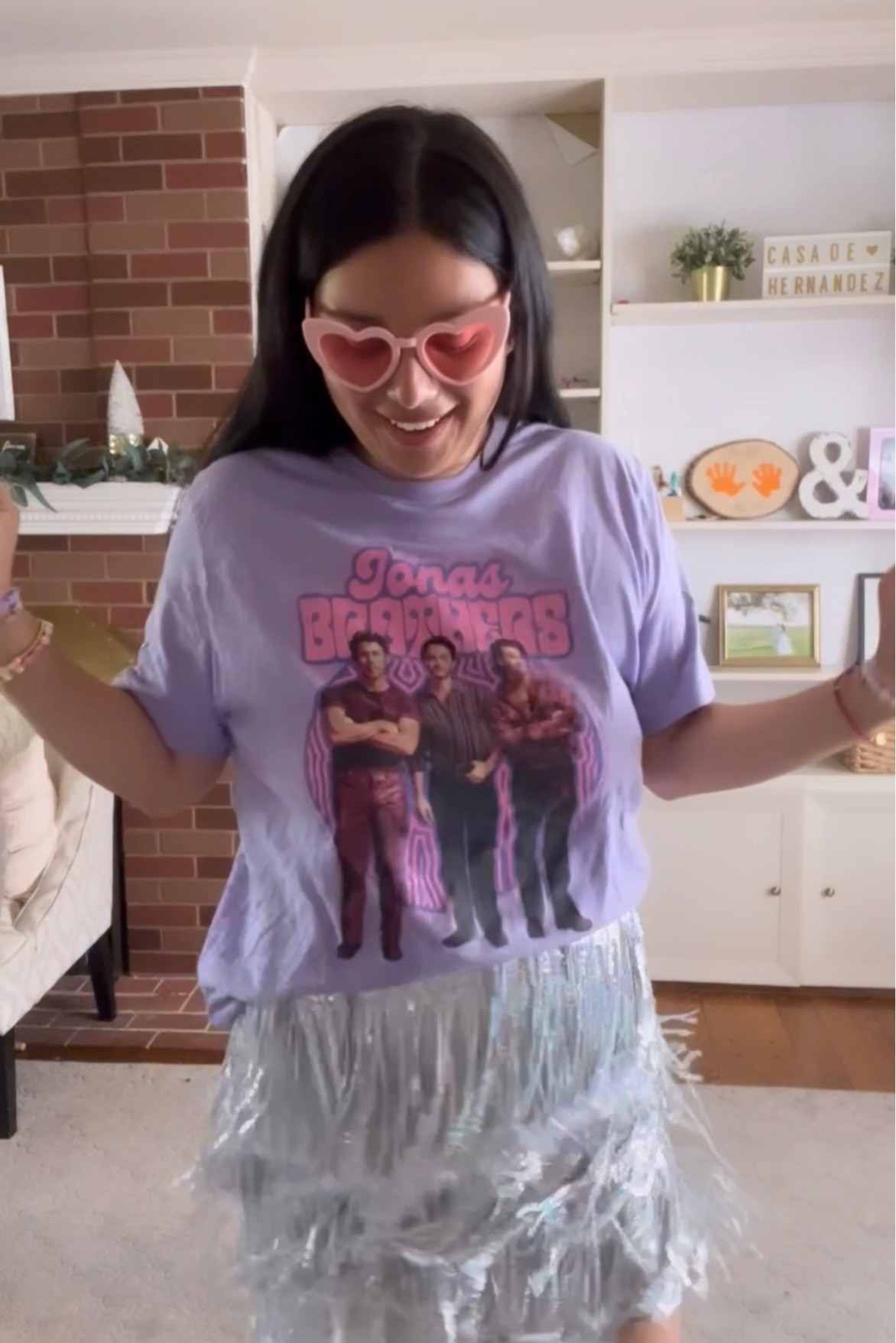 Fun girly Jonas brothers concert outfit for The Tour 💜✨ 

jonas brothers concert | concert outfit | concert outfits | concert fit | sequin skirt | graphic tee | 

#LTKstyletip #LTKmidsize