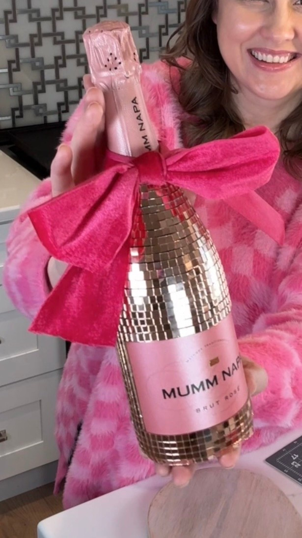 🪩✨ DIY DISCO CHAMPAGNE BOTTLE ✨🪩 This might be the coolest Valentine’s (or Galentine’s!) gift ever 💕🥂 I used mosaic tiles, cut them to size, and attached them to a champagne bottle for the ultimate disco moment — and I’m obsessed 😍

Such a fun, creative way to dress up a simple bottle and make it feel extra special ✨ Perfect for gifting, parties, or a festive Valentine’s night in 💖

🔗 I linked the mosaic tiles + DIY supplies on my LTK so you can recreate this look easily!

#LTKDIY #LTKHome #LTKValentines #DIYDecor #ValentineGiftIdea #DiscoVibes #GalentinesDay #CraftyIdeas #LTKFamily

#LTKValentine #LTKSeasonal #LTKHome
