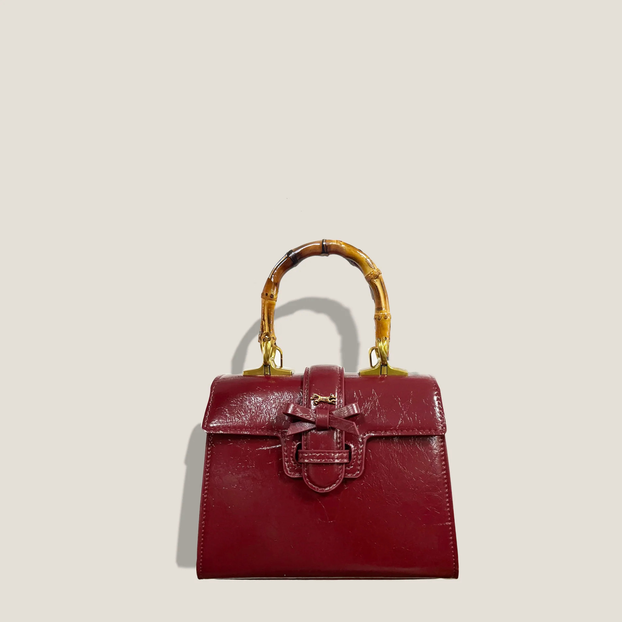 THE CARLTON BOW BAG 20cm - BURGUNDY "Crushed Patent" | MME.MINK
