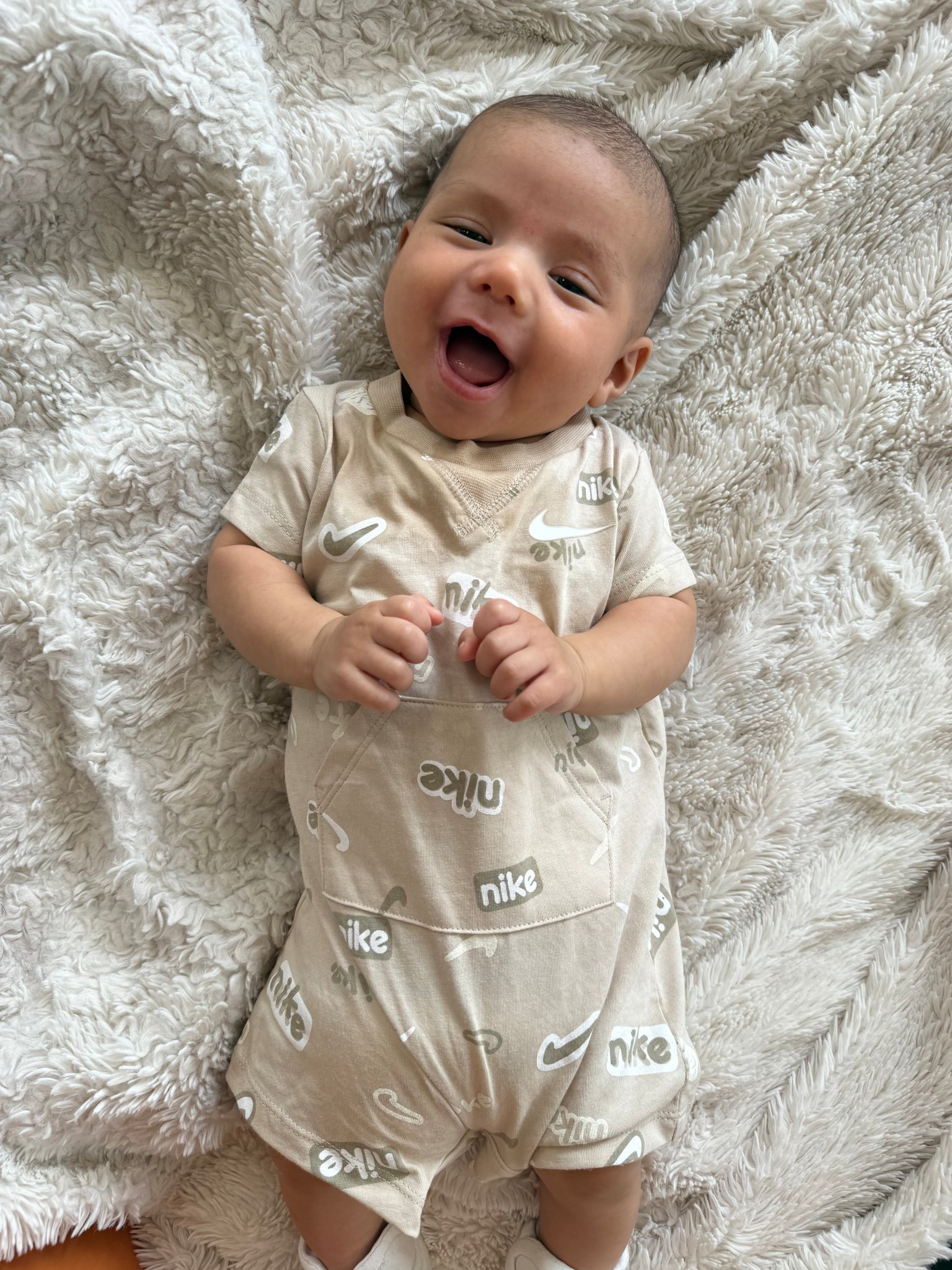 This little baby romper is too cute! Nike baby stuff runs small - so I would size up so they can wear for longer. Makoa is 11 weeks in this pic and he’s wearing the 3m!

#LTKBaby