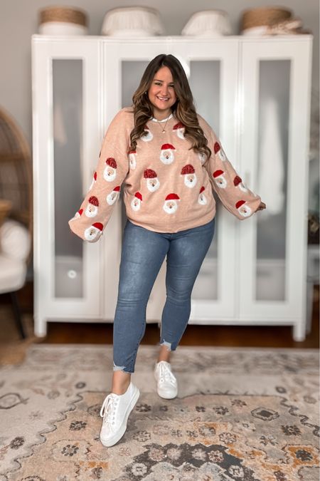 The cutest holiday sweater! Love my pink Santa sweater so cute for office parties or any Christmas party on your calendar!

Paired with my favorite skinny jeans under $30!

Holiday sweater
Christmas sweater
Santa sweater
Walmart jeans
White sneakers
Casual holiday outfit 

#LTKmidsize #LTKSeasonal #LTKHoliday
