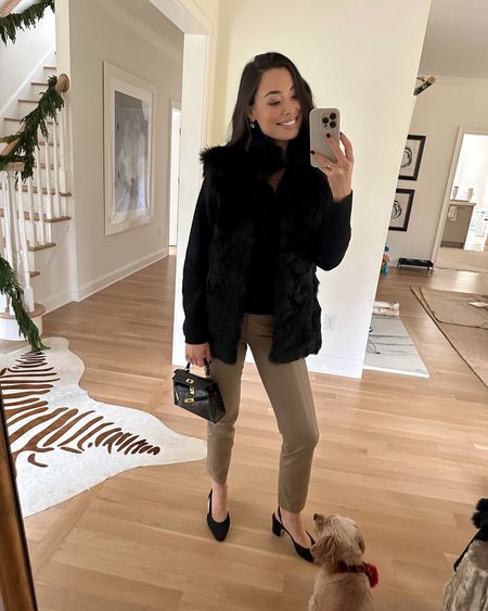 Kat Jamieson wears leather pants and a fur vest to Christmas. Chanel sling back pumps, winter outfit. 

I’m wearing a size small in the vest which I love because I can layer a sweater under it - however if you’re extra petite, you could size down! 

#LTKSeasonal #LTKHoliday #LTKworkwear