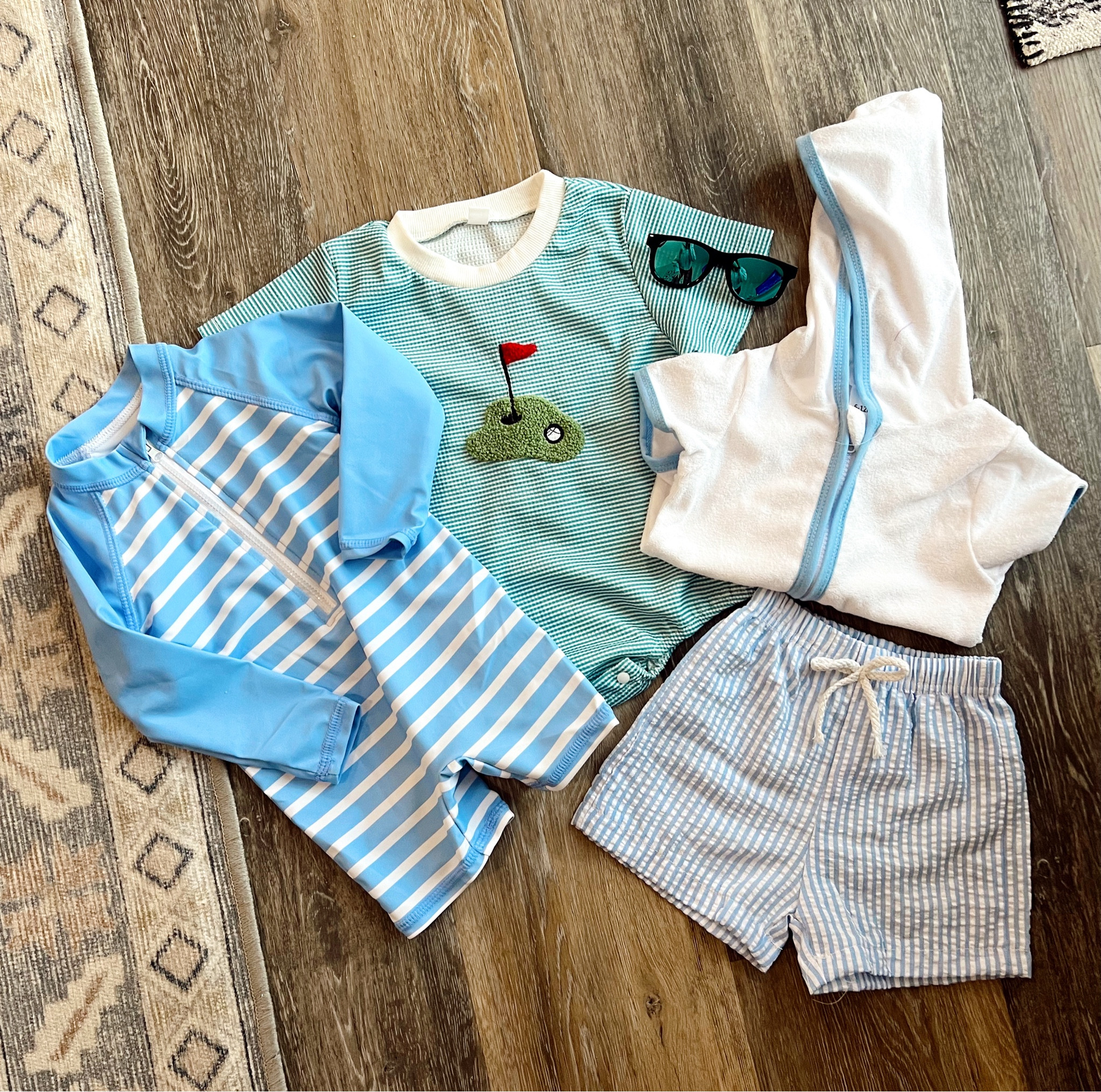 Baby boy summer clothes 
Amazon finds 
Boy clothes 
Baby clothes 
Baby bathing suit 
Golf onsie 

#LTKFamily #LTKBaby #LTKSeasonal