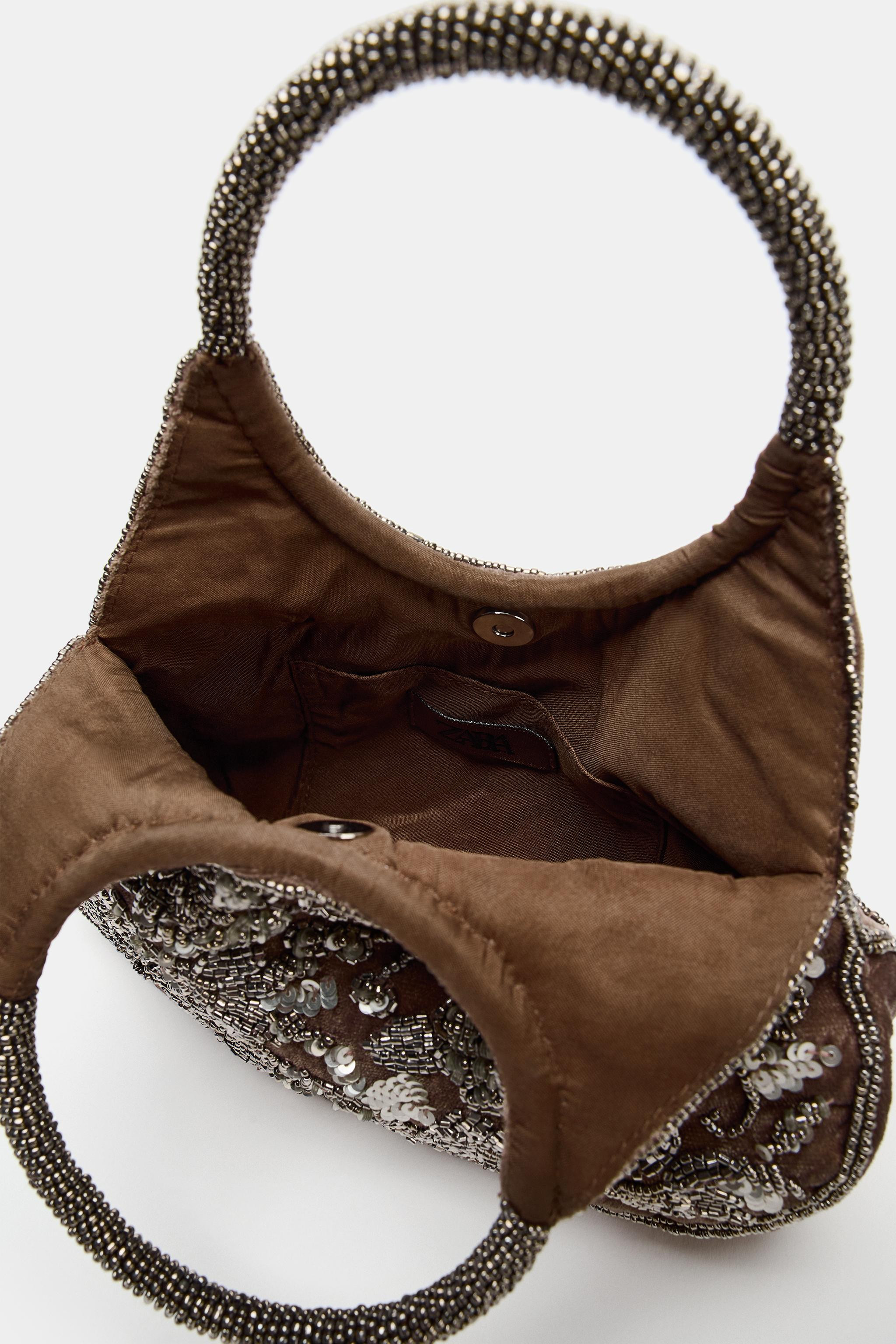 Mini handbag with a velvet-effect body and beaded floral print. Featuring dual rigid top handles.... | Zara US