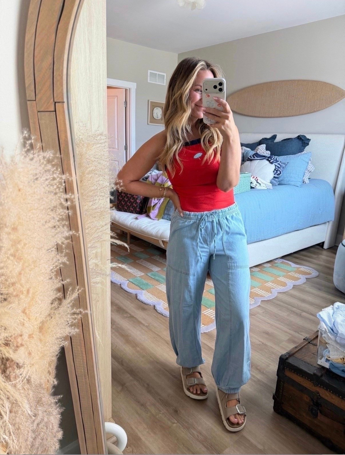 Red, white & cute ❤️🤍💙

This outfit is giving effortless summer style. The pop of red tank, lightweight chambray joggers, and comfy buckle sandals are the perfect combo for everything from weekend errands to backyard BBQs. Easy, flattering, and comfortable enough to wear all day long.

#summeroutfit #casualsummerstyle #redwhiteandblue #memorialdaystyle #fourthofjulyoutfit #chambraypants #everydayoutfit #momstyle #comfortablefashion #summerfashion #affordablestyle #weekendoutfit #ltkfashion #ltkstyle #amazonfashion