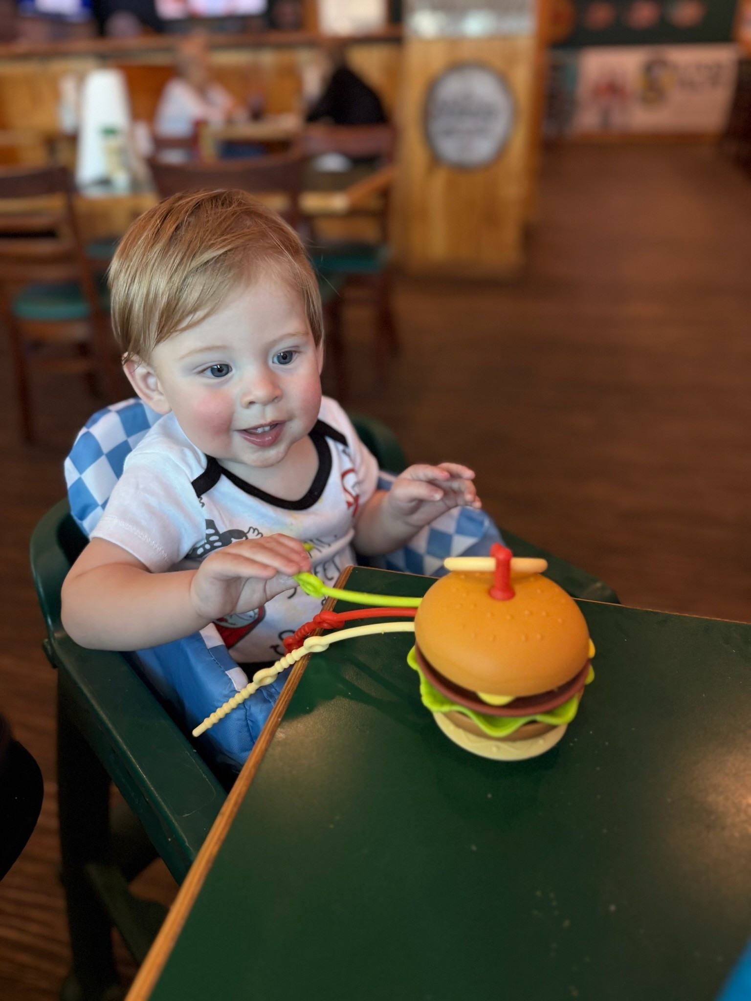 Storm’s high chair insert and hamburger suction toy for the win while eating  out! 

#LTKFamily #LTKFindsUnder50 #LTKBaby