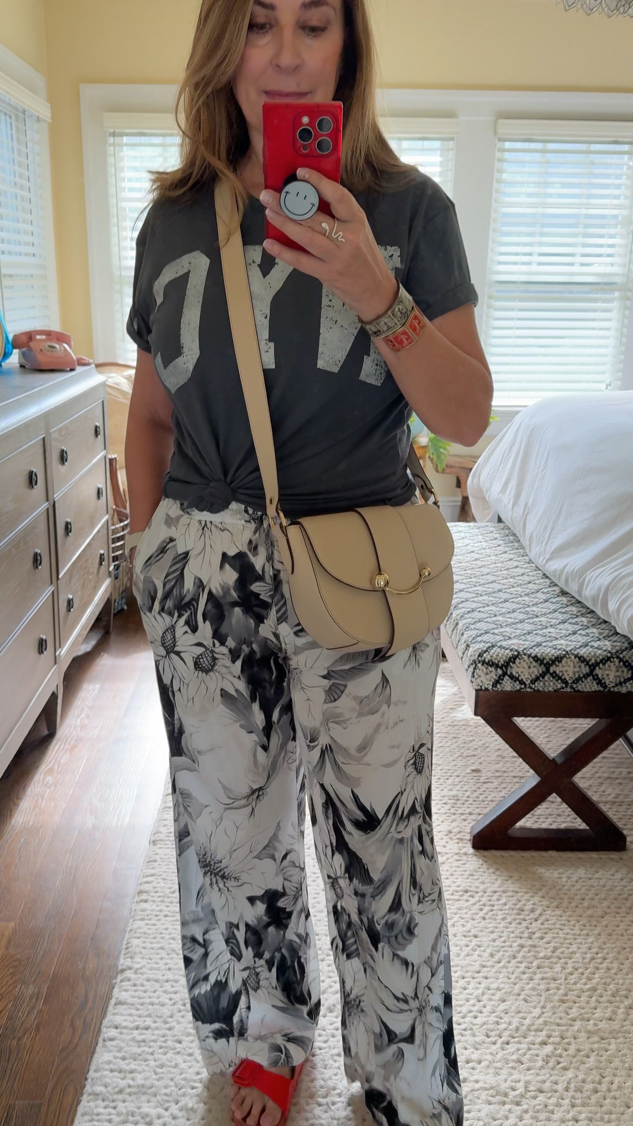 Shhhhh! Nobody will know I’m wearing PJ pants! Cute ✅ comfy ✅ cheap ✅ 
Paired with a graphic NYC tee, my favorite new cross body bag (the gold hardware reminds me of a smile 😊) and a pop of red in my shoes.
Pants - large 
T-Shirt - extra large 


#LTKOver40 #LTKStyleTip #LTKMidsize