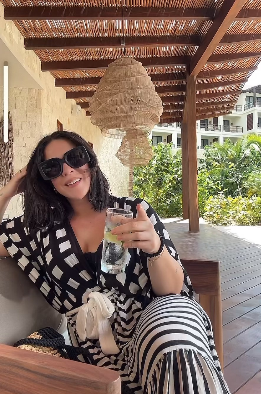 Mexico vacation style. Black and white kimono. Mines the FP one and sold out but it’s called the Kenna Ruffle Kimono if you want to try to find it used! I linked the Amazon one which has good reviews. 

Sunglasses are TopFox - code NINA FOR $$ off 

#LTKTravel #LTKSwim #LTKMidsize