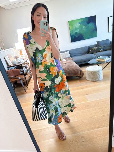 Floral dress- love how unfussy it feels on, plus it has pockets! Worn with a striped bag and sandals.

#springoutfits
#summeroutfits
#vacationoutfits
#dresses
#beachtote

#LTKtravel #LTKSeasonal #LTKshoecrush
