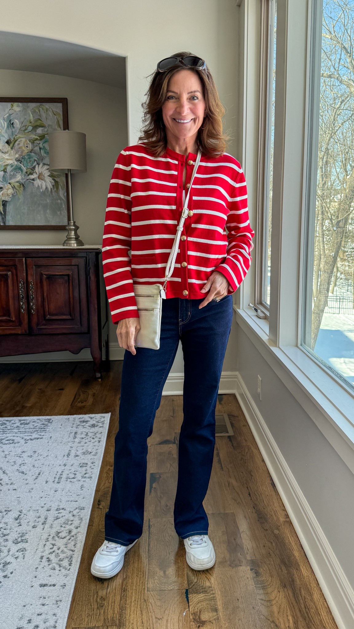 A classic red striped cardigan paired with dark denim and white sneakers — easy, polished, and perfect for everyday errands or casual travel days. This is one of those throw-on outfits that always works and never feels overdone.

#StripedCardiganStyle #CasualEverydayOutfit #ClassicCasualLook #DenimAndSneakers #EffortlessStyleOver40