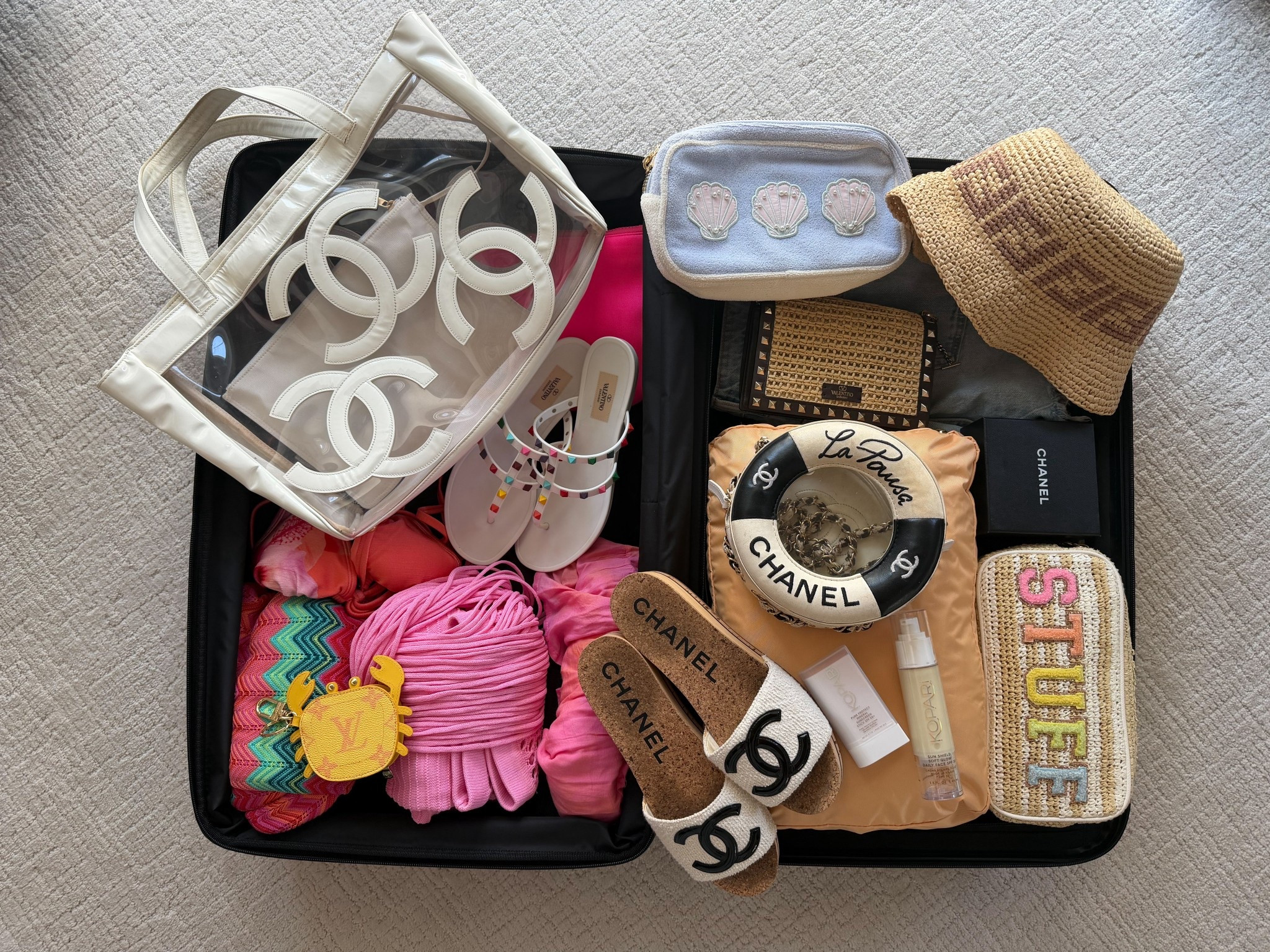 Packing for spring break 
Travel and beach vacation 
Resort bags and Chanel sandals 