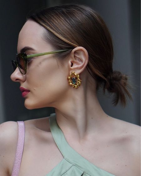 Statement earrings in gold and light green by Dhwani Bansal #ad 

#LTKFind #LTKGiftGuide #LTKstyletip