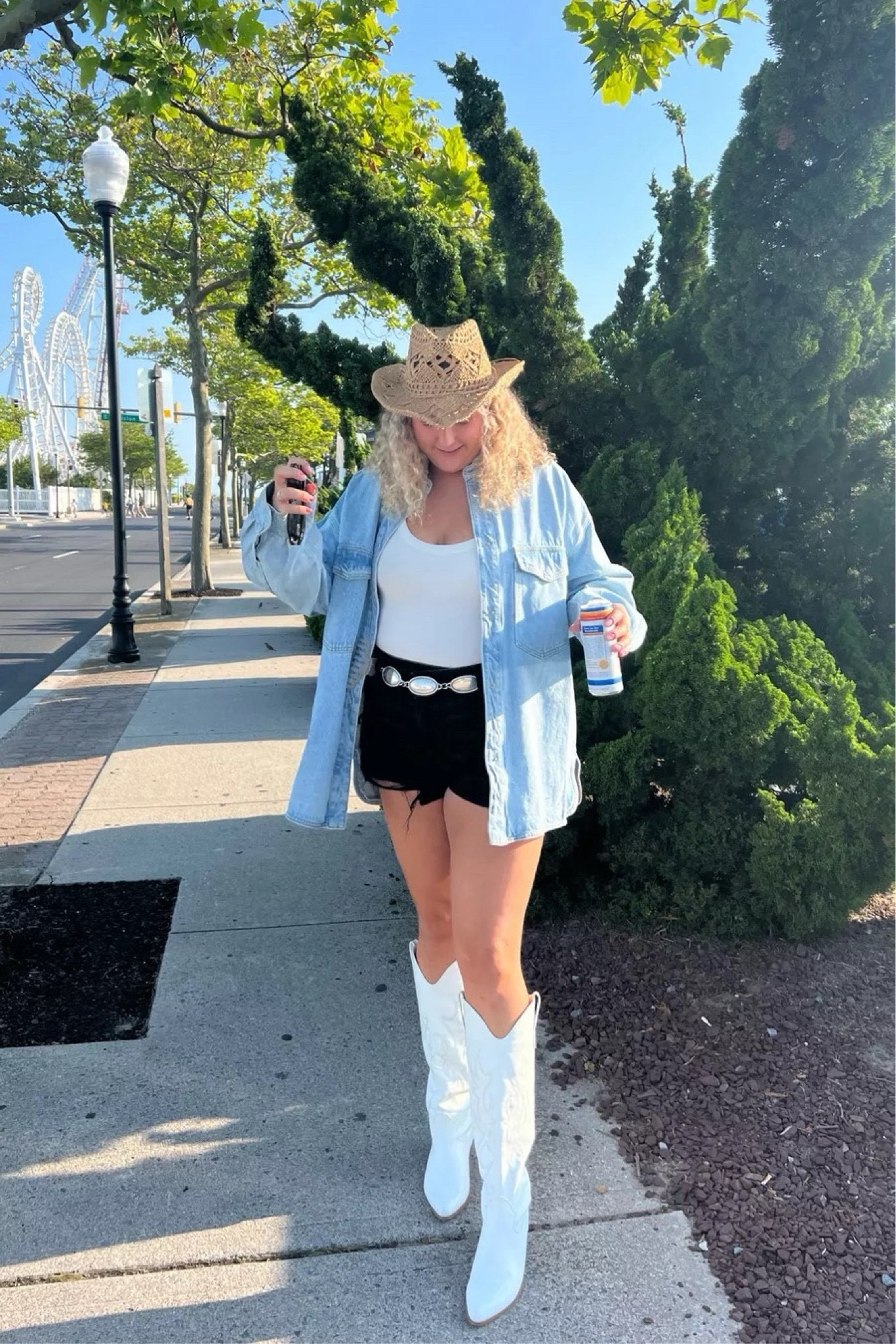 
Country concert outfit, denim shacket, white bodysuit and black jean shorts with cowboy boots and cowboy hat for the rodeo, nashville outfit, summer rodeo look, festival outfit, festival look

#LTKStyleTip #LTKMidsize #LTKFindsUnder50