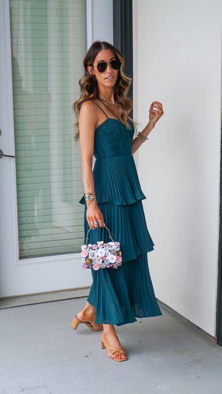 Wore this gorgeous pleated dress to my cousin’s wedding last night! Got so many compliments! Great if you want to eat and drink without having to worry about belly bloat! Wearing and xsmall

Wedding guest dress | wedding guest dresses | summer wedding | fall wedding | wedding guest outfit | clutch 

#LTKStyleTip #LTKFindsUnder50 #LTKWedding