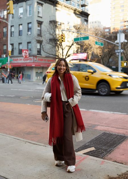 New York City winter outfit ❤️ | red scarf | beige wool coat | long wool coat | beige winter coat | long wool scarf | long chunky scarf | brown trousers | abercrombie trousers | abercrombie sloane pants | white ear muffs | fuzzy ear muffs | winter outfit | city outfit inspo | neutral fashion | winter fashion 

#LTKfindsunder100 #LTKSeasonal #LTKsalealert