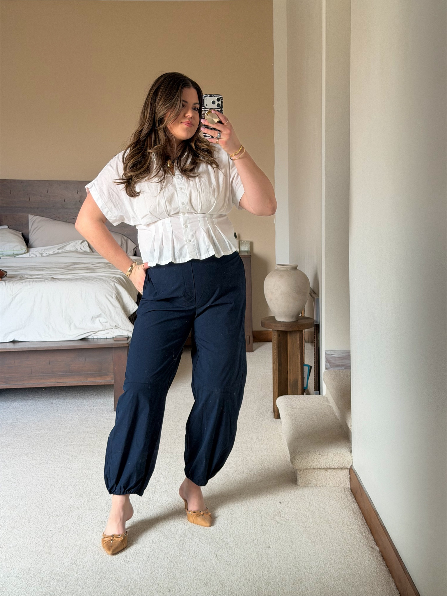 Another way to style the navy Old Navy joggers, you can dress these down or dress them up. I’m in size large. Love it with this pop in top for the office or out a white blazer for date night

Midsize, size 12, size 14, big tummy approved