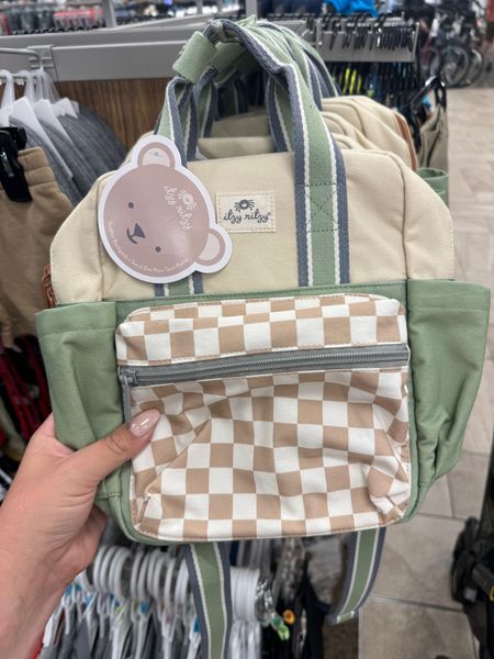 This checkerboard and sage green has warm muted tones perfect neutral aesthetic for toddler boys or toddler girls or just for moms diaper bag. School backpack for little ones!

Adventure awaits! Mini size for itzy trips! Lightweight & lovable, our Itzy Bitzy Bag is the perfect tagalong for trips around the block or around the globe! Spacious main compartment with wipeable fabric lining and name label on the inside. Generous side pockets for water bottles and sippy cups and handles snap together for easy carrying. Soft, adjustable shoulder straps provide a just-right fit. Durable cotton exterior with side loop for attaching clips, charms, toys, etc.

#LTKfamily #LTKkids #LTKtravel