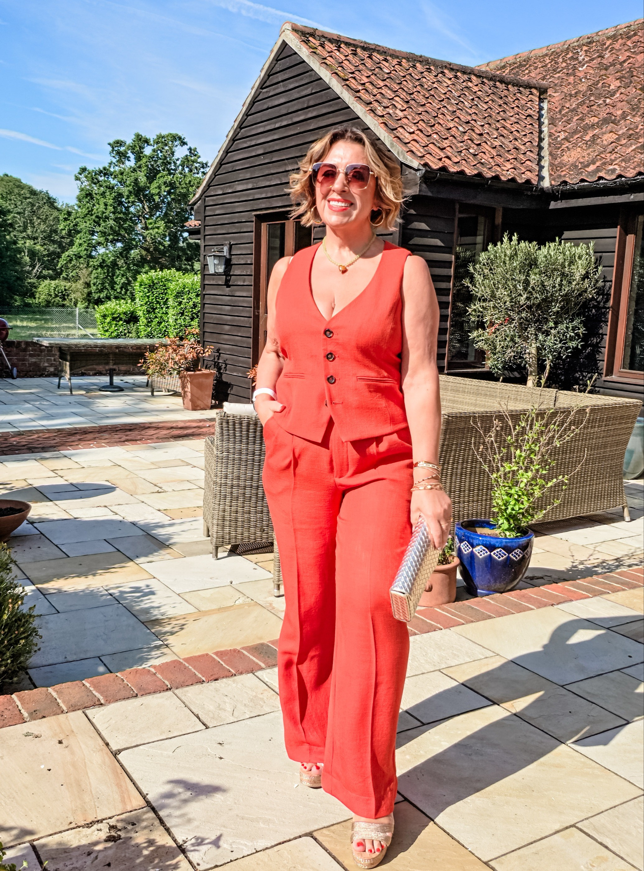 Designed in London, handmade in Europe,  this orange waistcoat with matching trousers, is soft and fluid to wear.

#LTKsummer #LTKover50style #LTKuk
