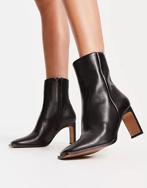 ASOS DESIGN Remmy set-back heeled boots in black | ASOS (Global)