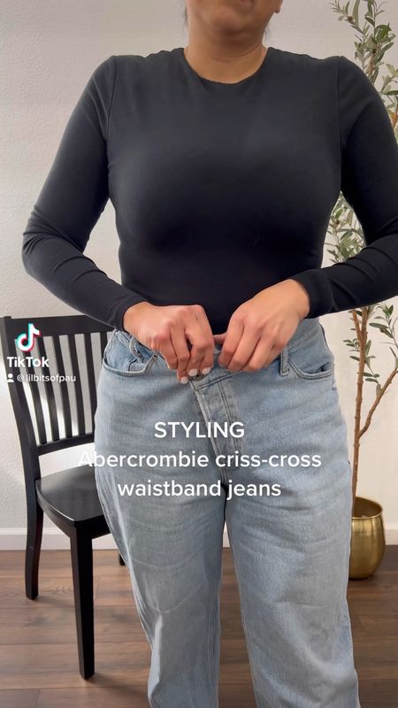 Abercrombie criss cross waistband jeans, black long sleeve bodysuit, Abercrombie long trenchcoat 

#LTKstyletip #LTKcurves #LTKSeasonal