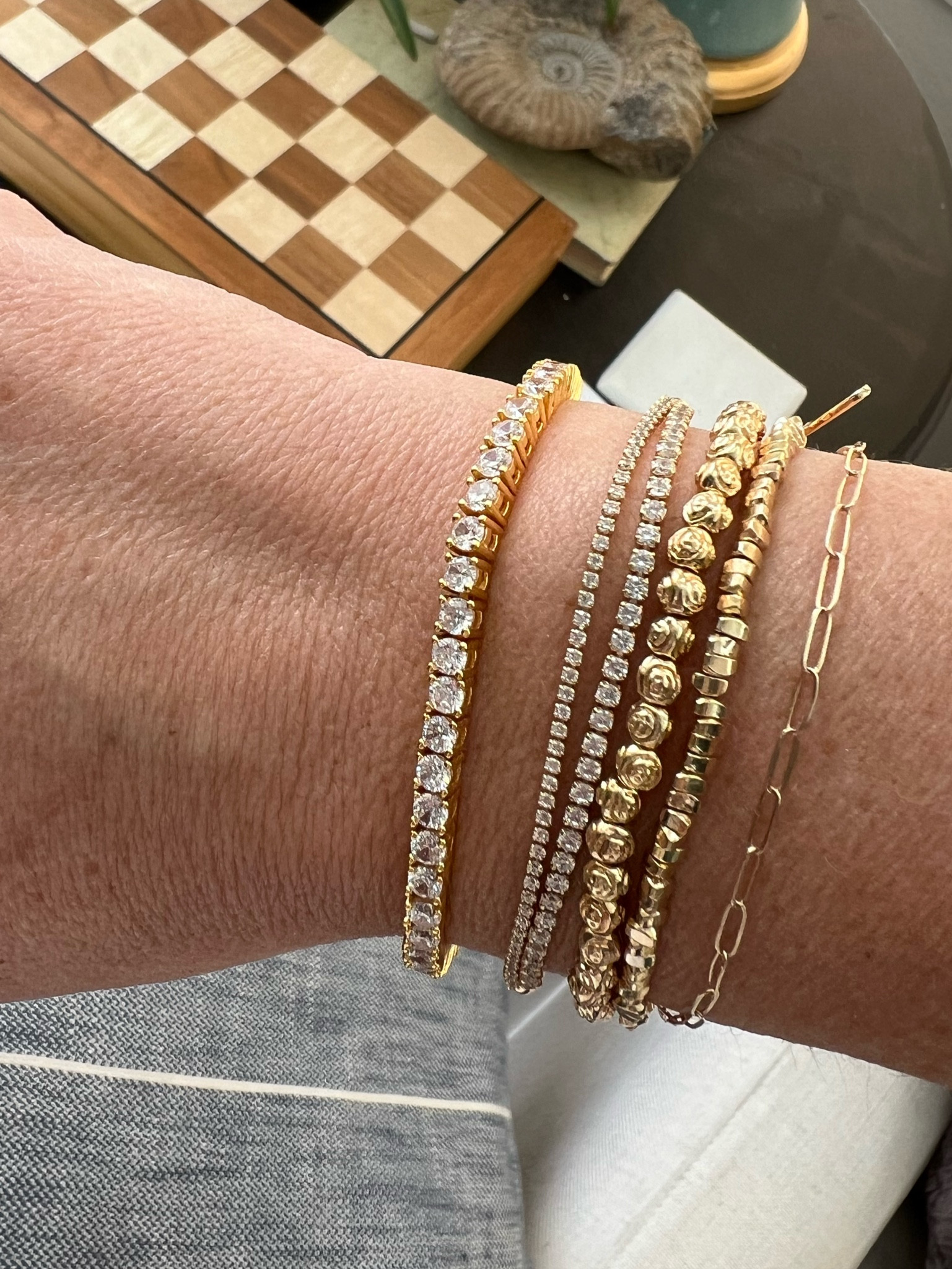 Gold diamond tennis bracelet and stacking bracelets 

#LTKStyleTip #LTKGiftGuide #LTKWorkwear