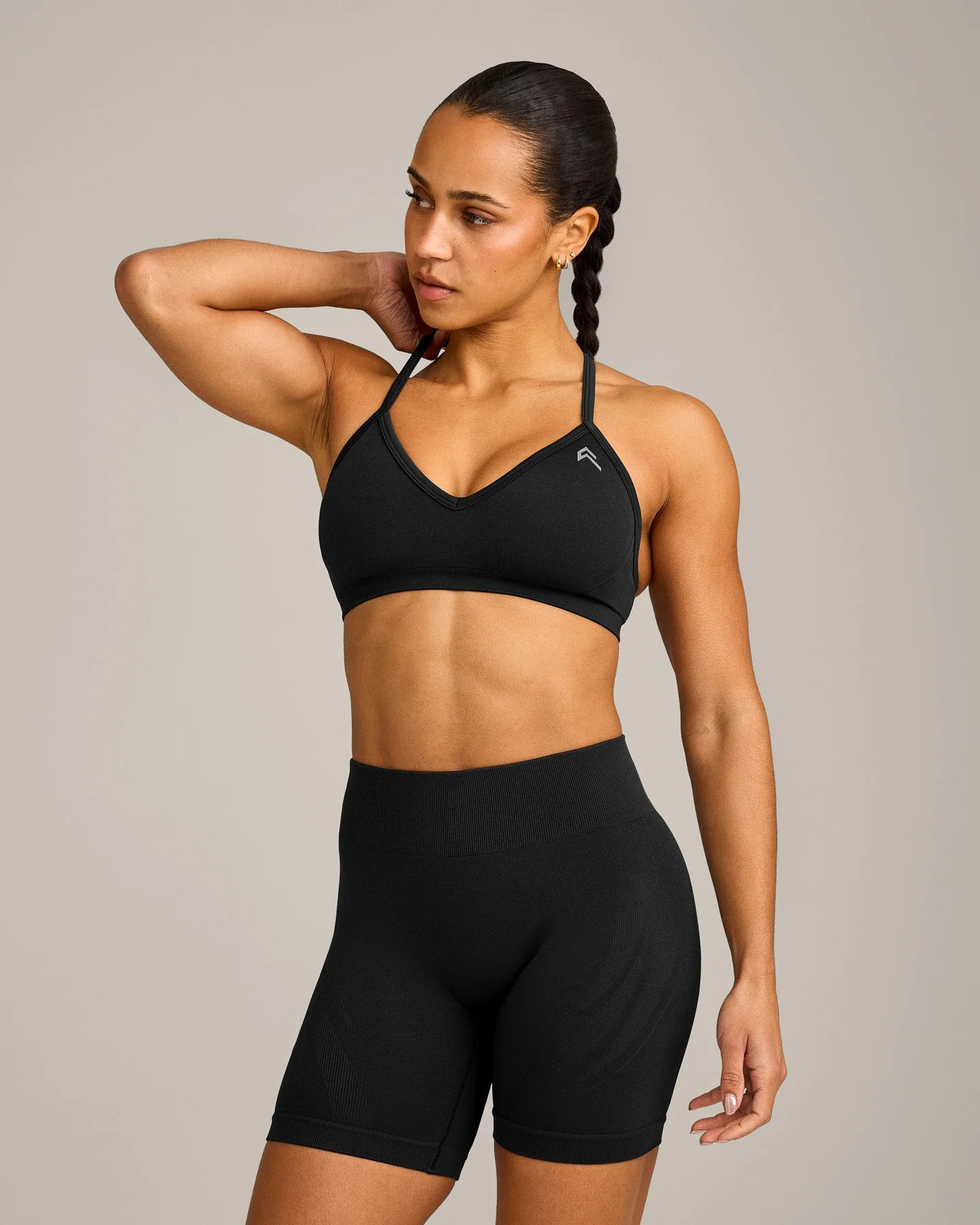 EnhanceLift™ Seamless Strappy Sports Bra with Gray Logo 
 Black | Oner Active (UK / US)