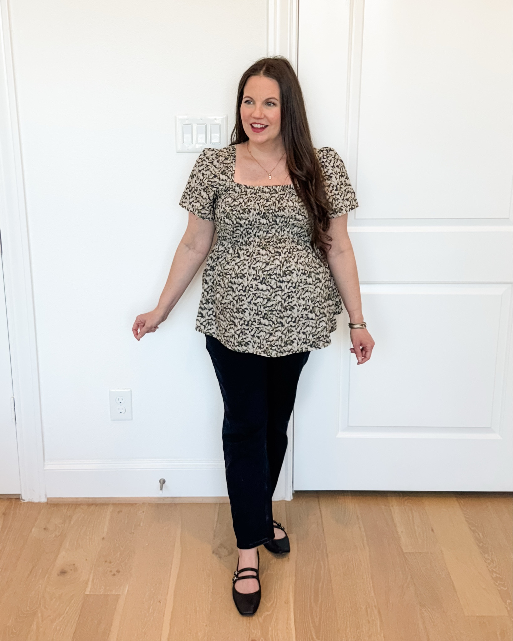 An effortless spring outfit featuring a comfortable maternity outfit perfect for everyday pregnancy style. This maternity smocked short sleeve top works beautifully as a workwear babydoll top and pairs with straight leg black jeans, my go-to best maternity jeans.

With classic black Mary Jane flats, this look is ideal for dressy casual style and versatile pregnancy-friendly workwear.


#LTKWorkwear #LTKBump #LTKSeasonal