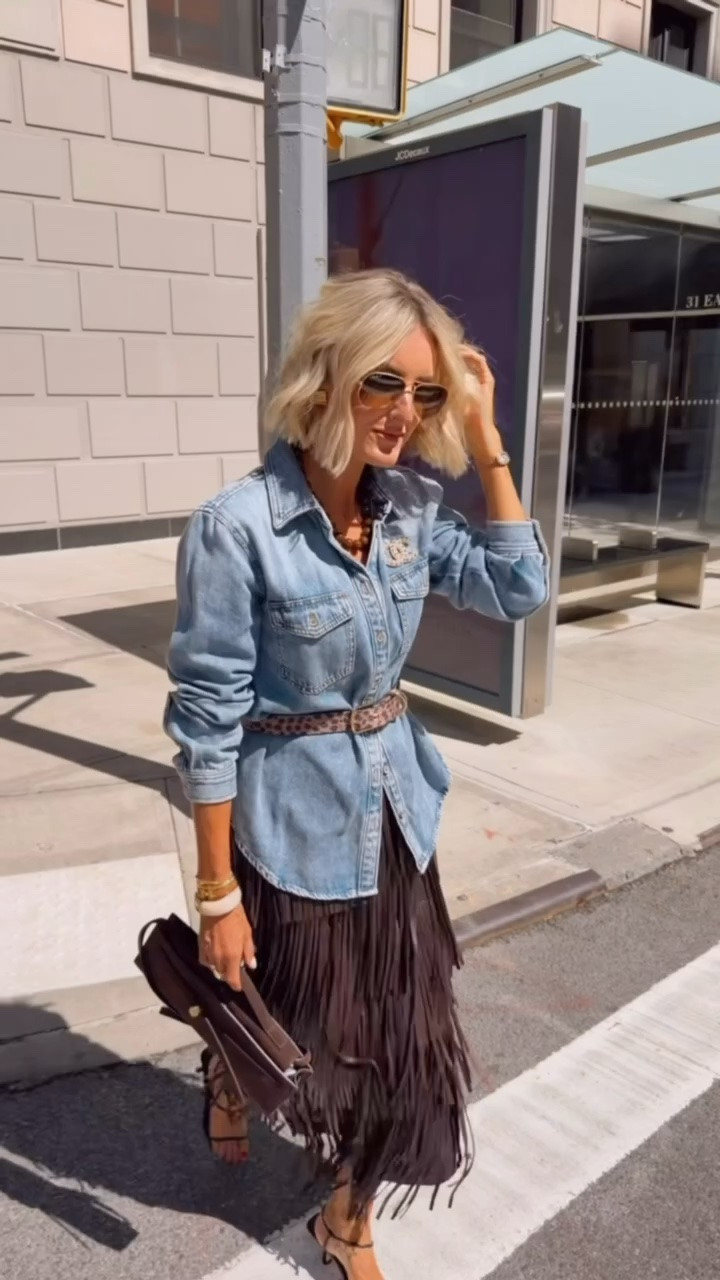 The most fun statement skirt ever for fall! The leather fringe is so fun while still being versatile since it’s a neutral color! Wearing XS top and 2 skirt

Loverly grey, vegan leather brown fringe skirt, western outfits, Nashville style inspo, country concert outfit ideas
